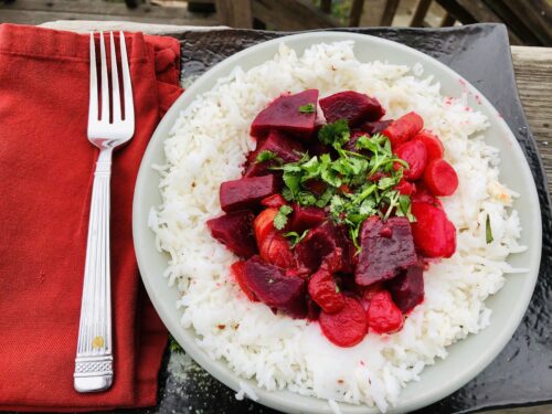 Beet Curry over rice with red napkin